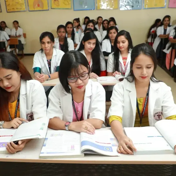 Nursing students studying together in a classroom