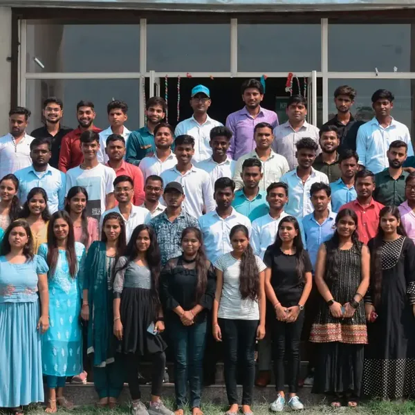 A large group of students outside their college building